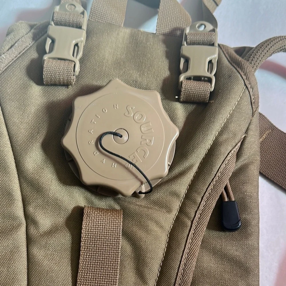 Tan Backpack with Padded Straps and Durable Fabric